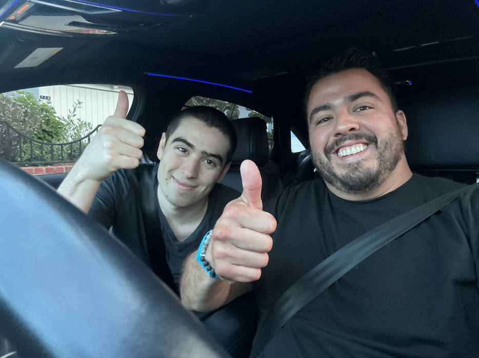 Clayton with a mentee in the car