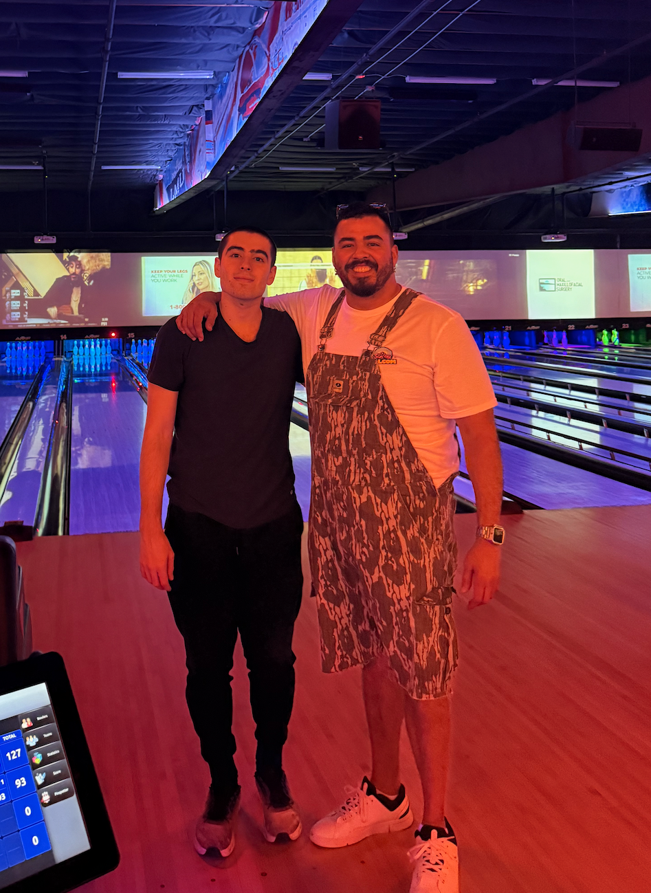 Clayton with a friend at the bowling alley